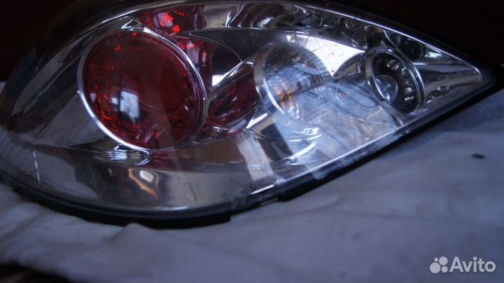 Фара nissan tiida задняя левая