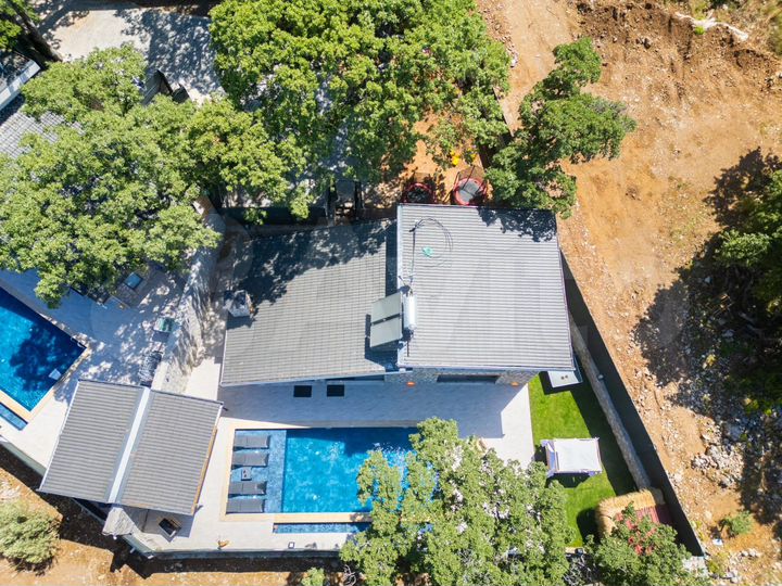 Коттедж 400 м² на участке 5 сот.