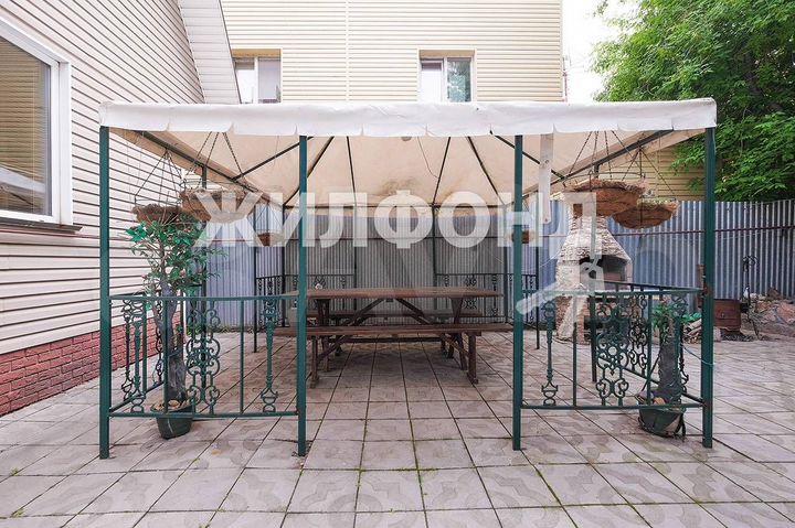 Коттедж 128 м² на участке 5 сот.