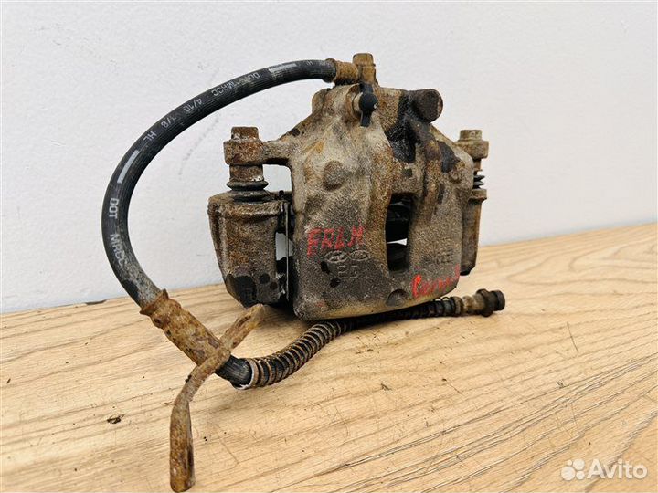 Суппорт тормозной передний левый Kia Cerato 2 1.6