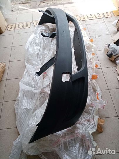 Бампер передний Logan-I после 12.2009 г.в без п/т