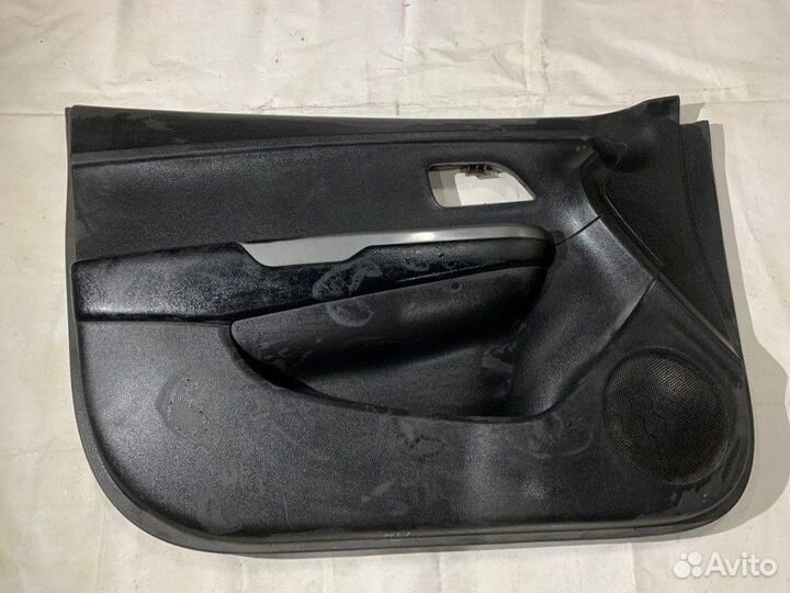 Обшивка двери передняя левая Kia Rio 3