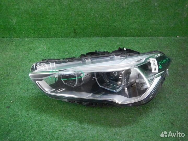Фара левая BMW X1