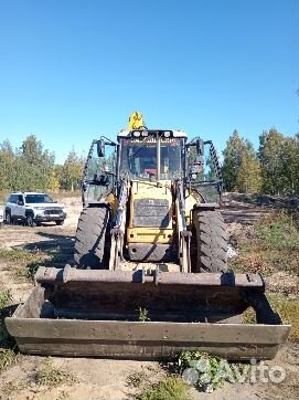 Экскаватор-погрузчик New Holland B115B, 2006