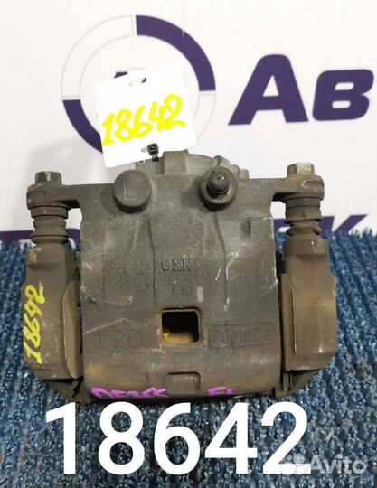 Суппорт Mazda Demio