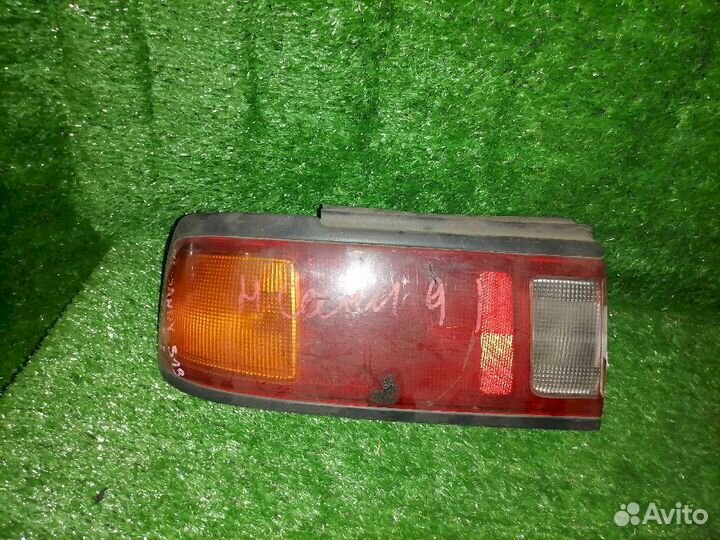 Фонарь (стоп сигнал) левый 7314 Nissan Sunny FB13