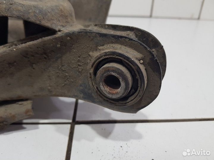 Рычаг подвески задний левый под пружину