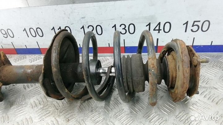 Стойка амортизатора переднего правого Nissan Almer