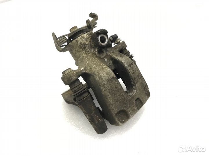 Суппорт тормозной задний левый Skoda Octavia 1.6