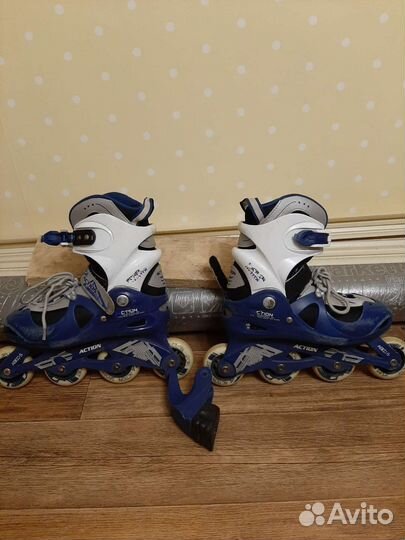 Роликовые коньки