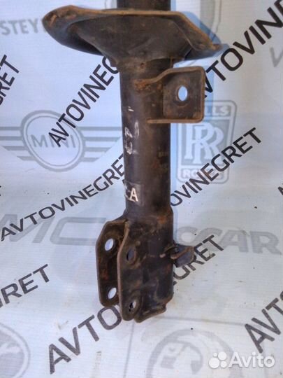 Стойка амортизатор передняя левая Nissan Cube