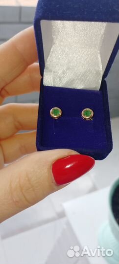 Золотые серьги с изумрудами