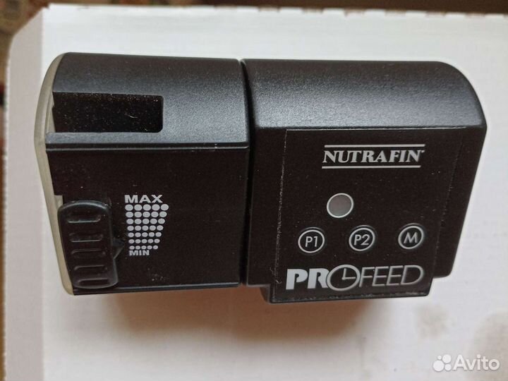 Автоматическая кормушка для аквариумных рыб