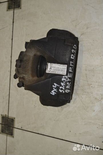 Тормозной суппорт передний правый Renault Duster