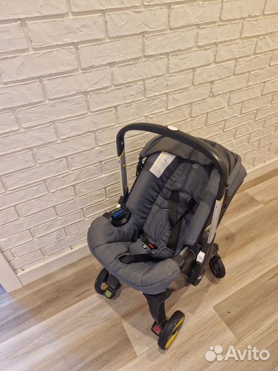 Коляска автолюлька doona