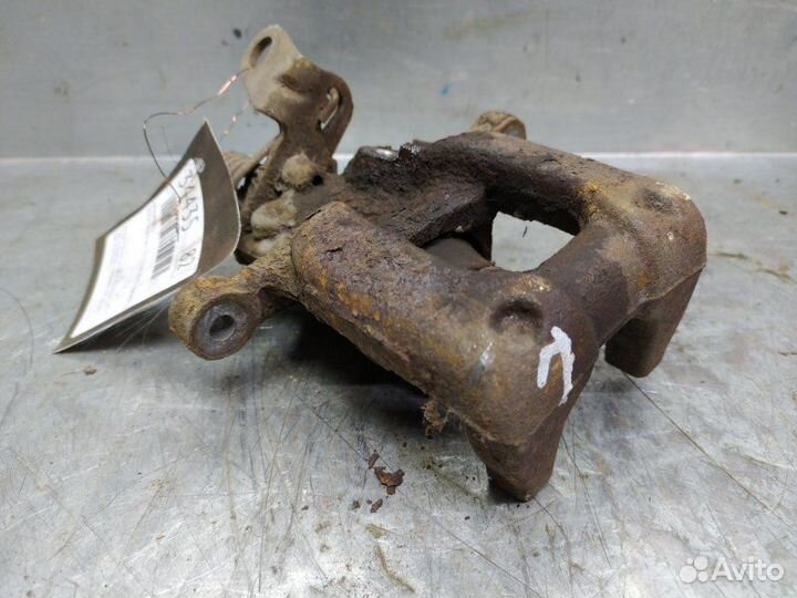 Суппорт тормозной задний левый Skoda Octavia (A5