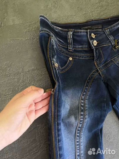 Фирменные джинсы женские