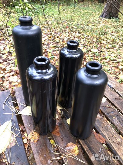 Черные керамические бутылки от бальзама