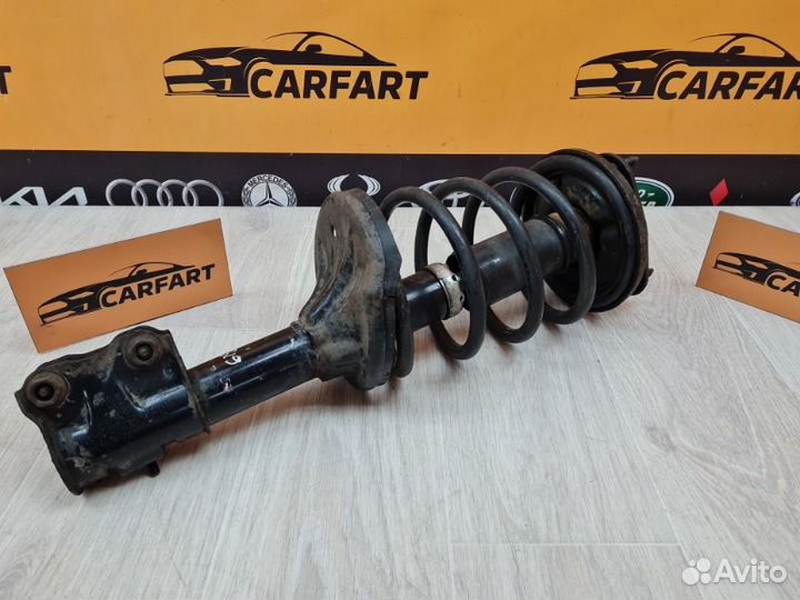 Амортизатор передний правый Mitsubishi Lancer CS3A