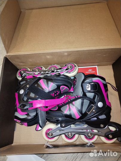 Роликовые коньки