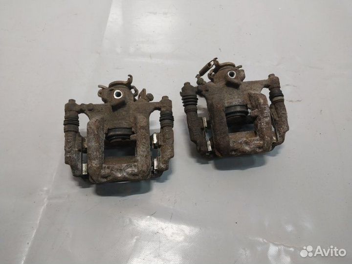 Суппорт тормозной задний Chevrolet Cruze седан 1.6