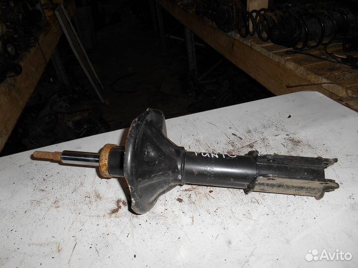 Стойка передняя Fiat Tokico A3012