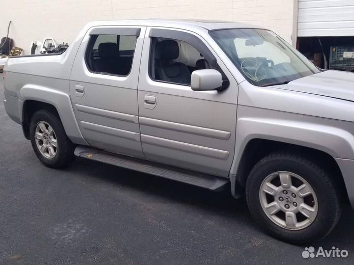 Суппорт тормозной задний правый Honda Ridgeline