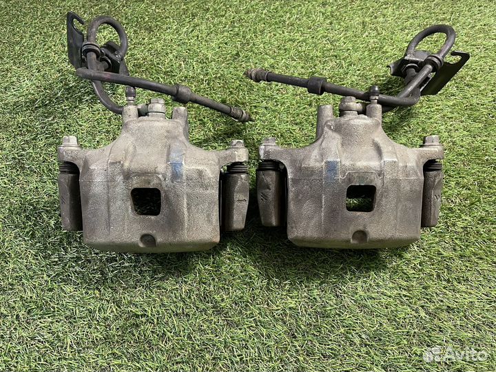 Тормозные суппорты передние Mitsubishi Lancer 10