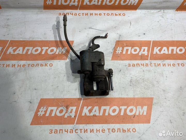 Суппорт тормозной задний левый Volkswagen Tiguan