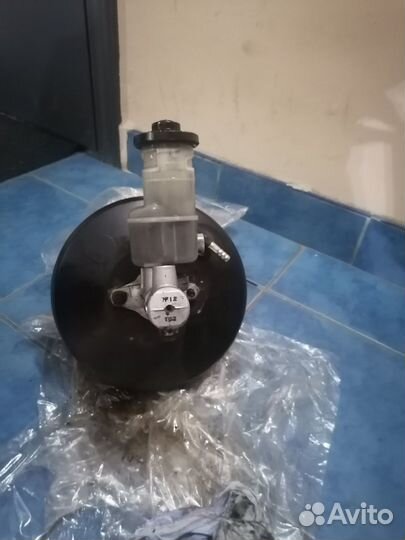 Бачок главного тормозного цилиндра в сборе с вакуу