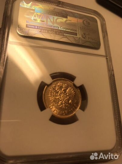 Золотая монета Николая II NGC AU 55