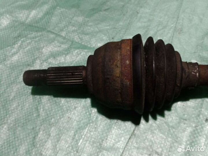 Полуось передний левый Ford Focus 1 седан 2.0I