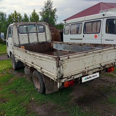 Бортовой Nissan Atlas, 1991