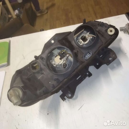 Фара левая Renault Laguna