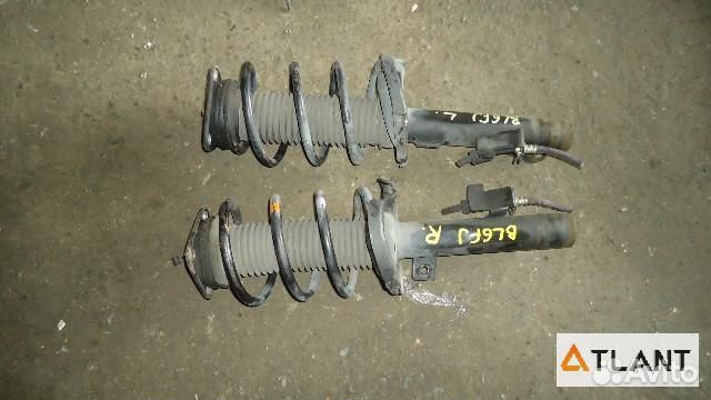 Стойка передняя левая mazda axela