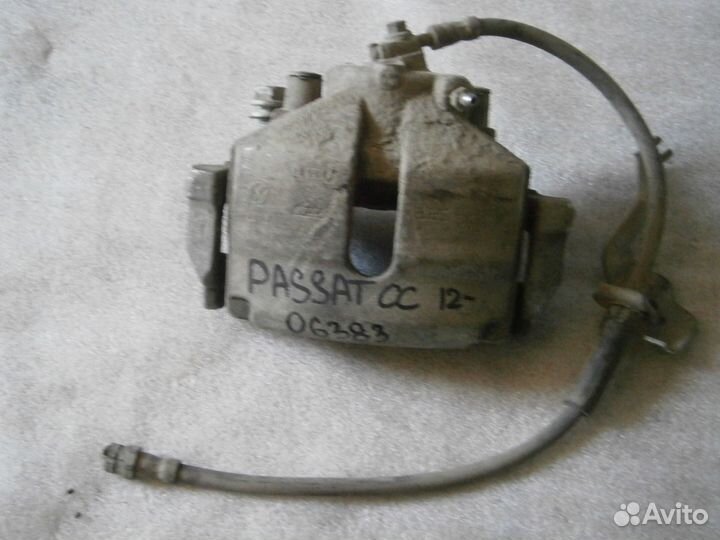 Суппорт передний левый Volkswagen Passat CC