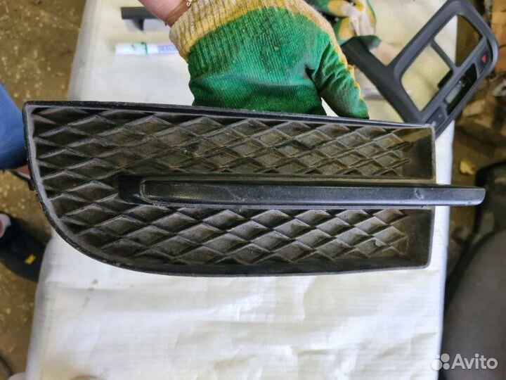 Заглушка бампера левая Chevrolet Aveo T250