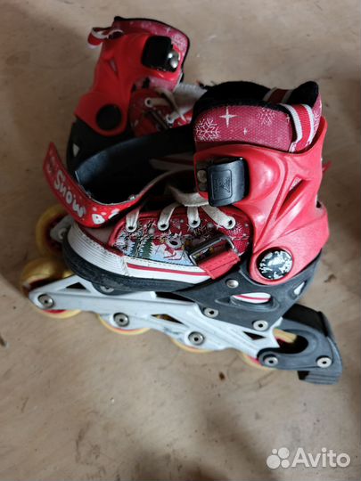 Роликовые коньки