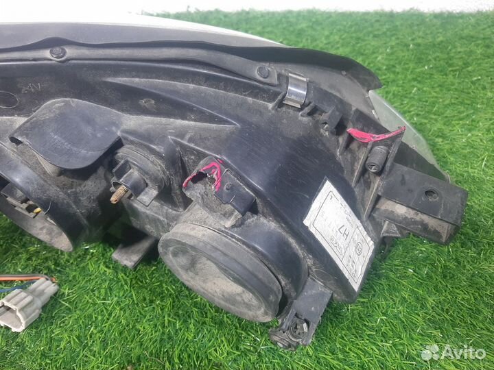 Фара левая на Nissan Primera 3 P12