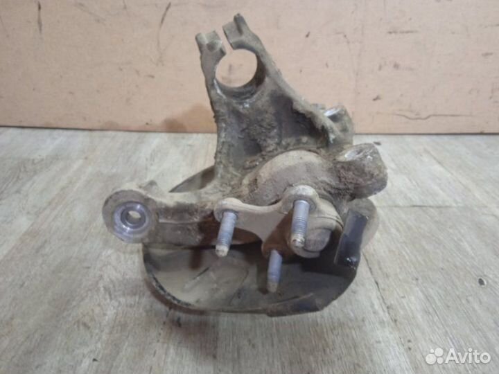 Кулак поворотный передний левый Volkswagen Passat