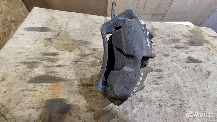 Суппорт тормозной передний левый AKL Passat B5