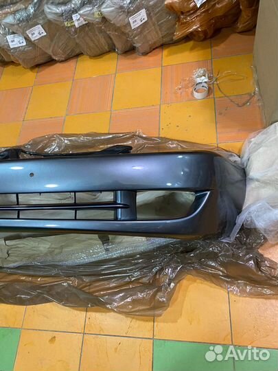 Бампер Лансер 9 передний серый 