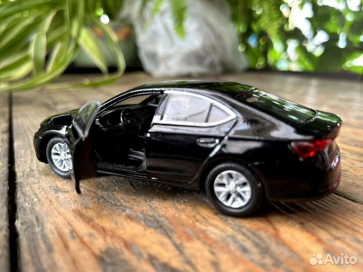 Welly масштаб 1:34 Skoda Octavia