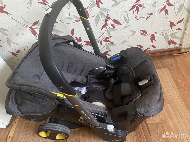 Коляска-автокресло tommy
