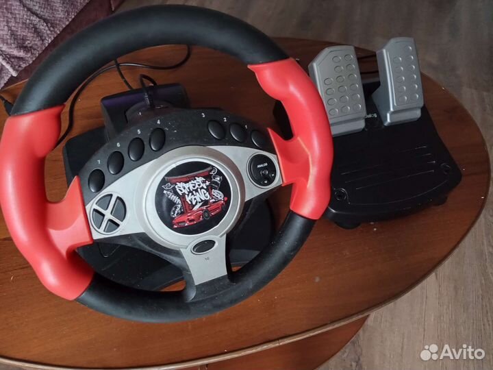 Игровой руль с педалямитдиалог