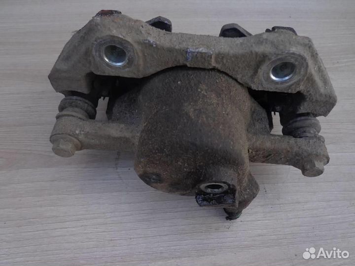 Суппорт передний левый VW Polo 5