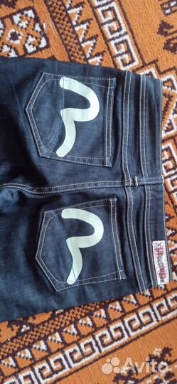 Джинсы evisu