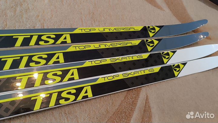 Беговые лыжи tisa с ботинками spine,два комплекта