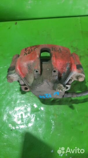 Суппорт тормозной Mercedes-Benz E-Class слева спер