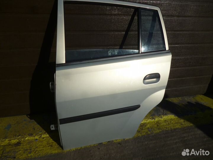 Дверь задняя левая Daihatsu mira, L250